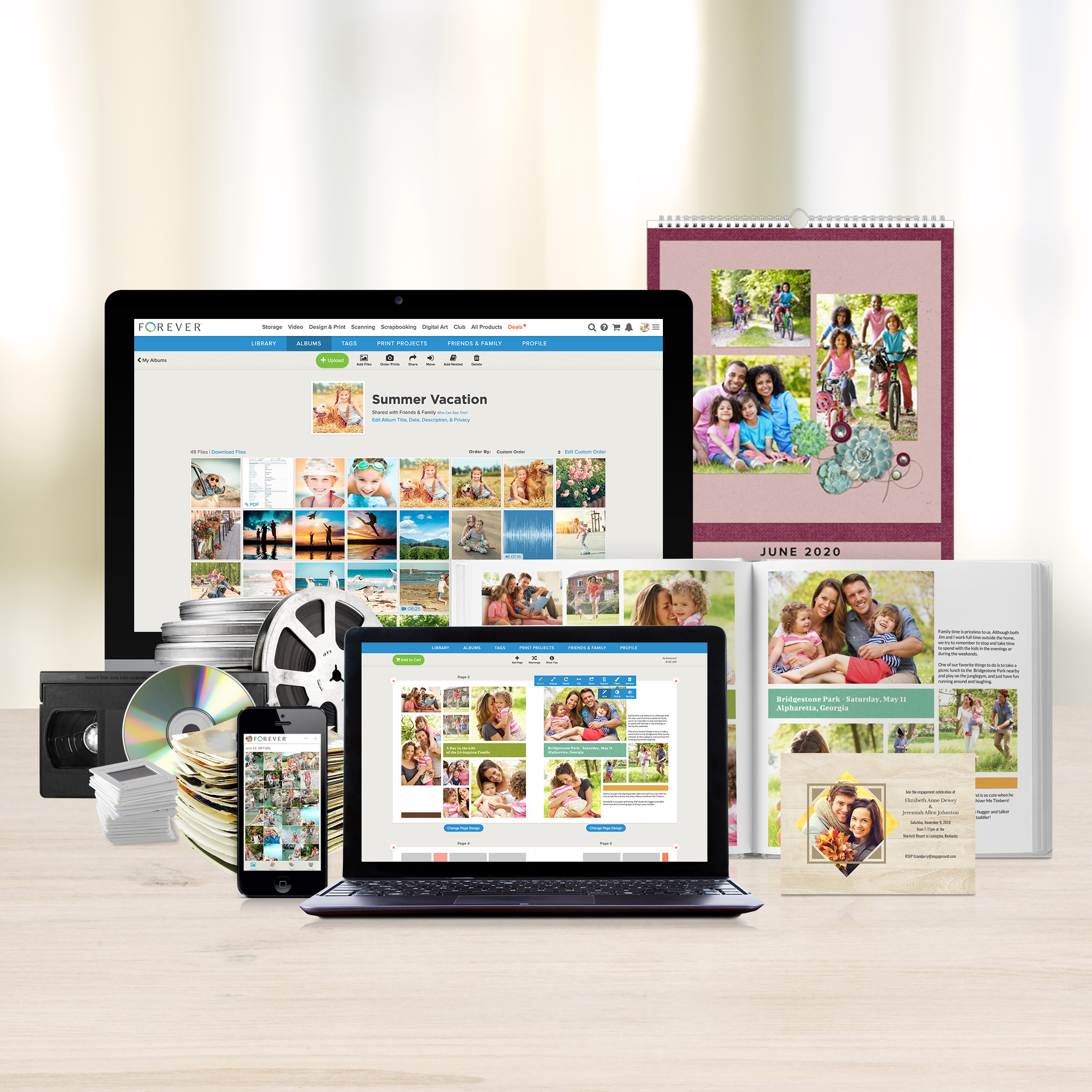 Image of desktop computers, calendars, memory books and more displaying high definition scanned and organized digital images